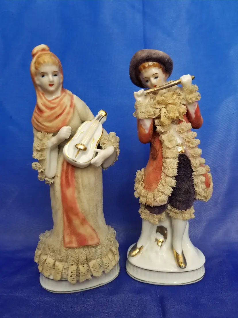 Vintage Porcelain Colonial Man and Lady figurines