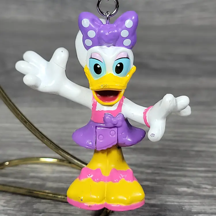 Disney Daisy Duck Keychain Bends At Waist