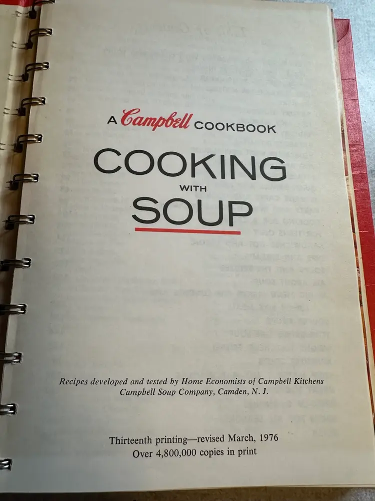 Vintage cookbook titled 'Cooking with Soup' by Campbell Soup
Company.