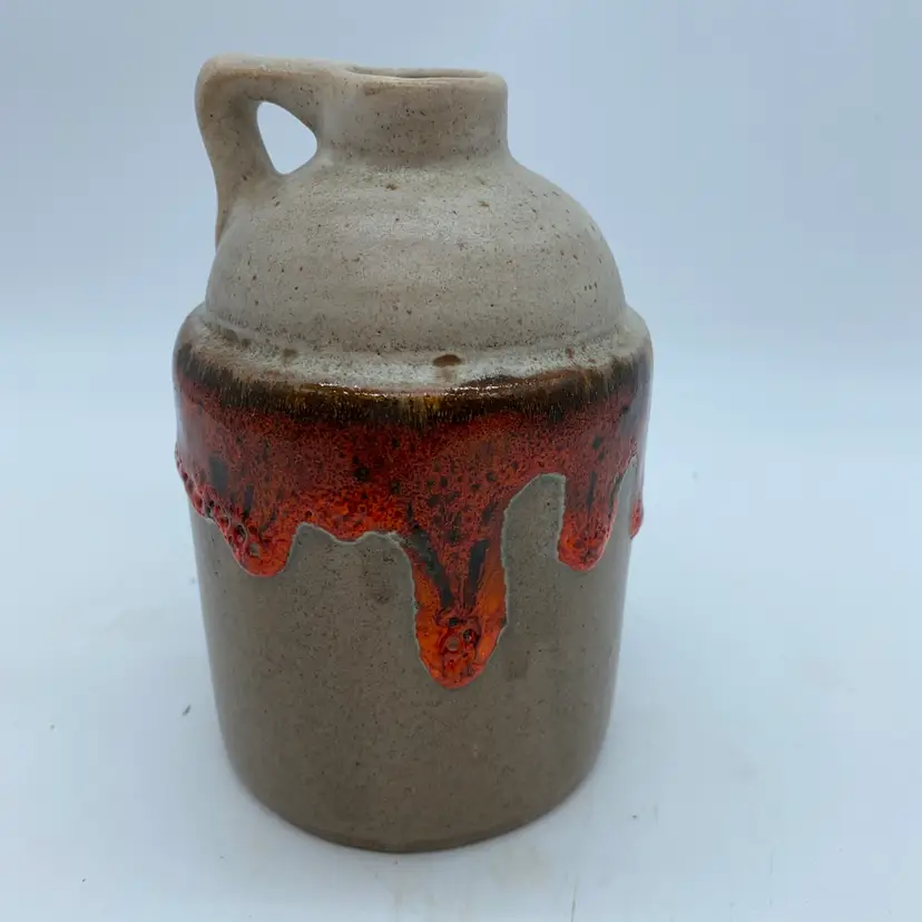 #2236 A vintage Laurentian Pottery ceramic jug with speckled glaze and Canadian marking.