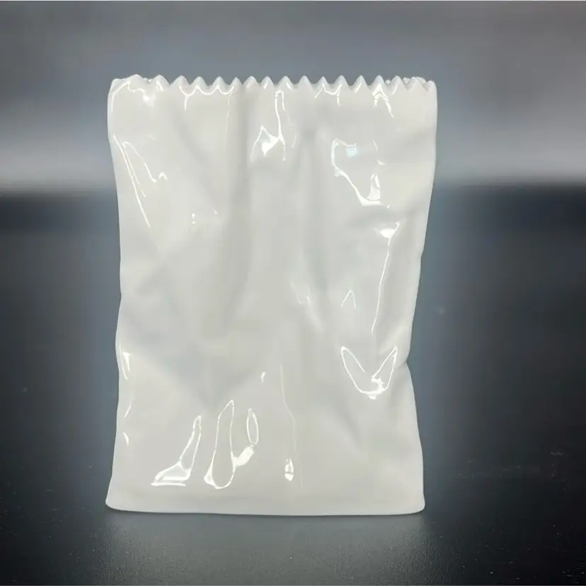 Rosenthal "Do Not Litter" paper bag vase