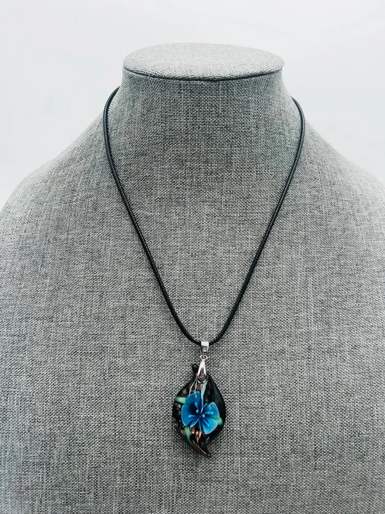 Glass Lampwork Blue Flower And Gold Shimmer Pendant With 18” Black Cord Necklace.