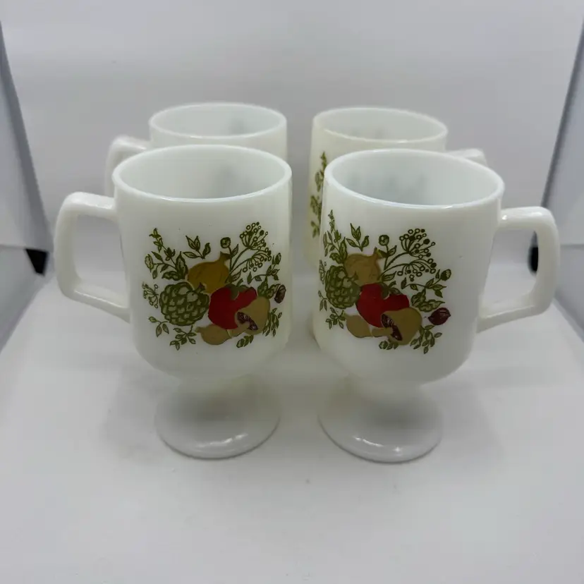 Set of four vintage milk glass pedestal mugs with 'Spice of Life'