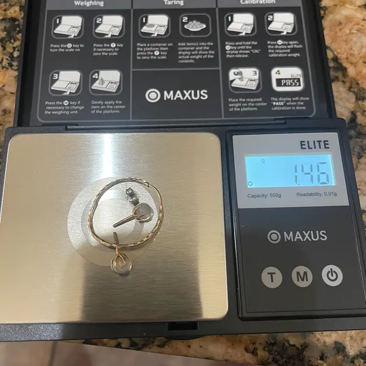 1.38 Grams 14k Plus Tiny Amount
Of 10k Scrap