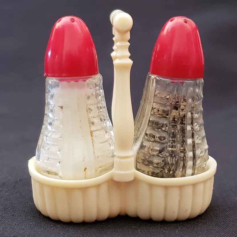 Glass Salt and Pepper Shakers with Red Lids in Plastic Basket Caddy Vintage