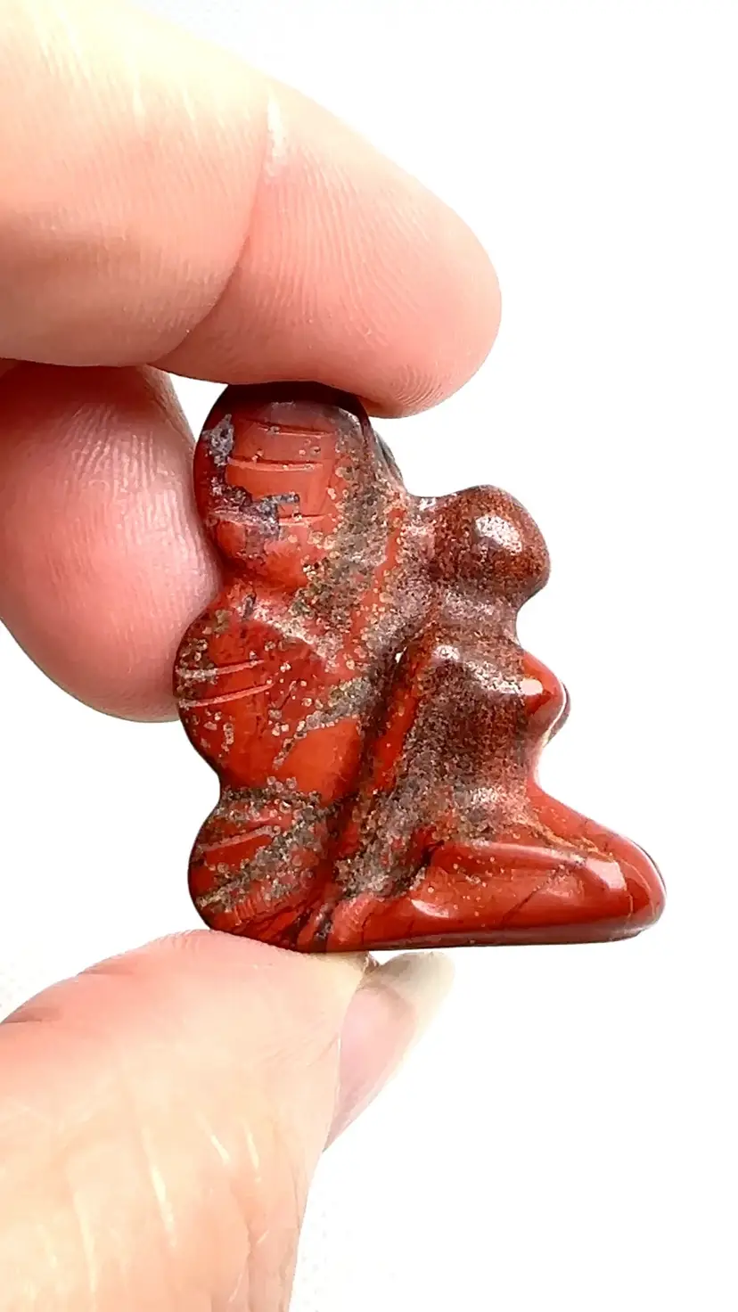 Red Jasper Kneeling Fairy Crystal Gemstone Carving Figurine. 1” length x 1/3” width x 1-1/4” tall