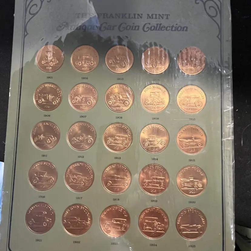 The Franklin Mint Antique Car Coin Collection
