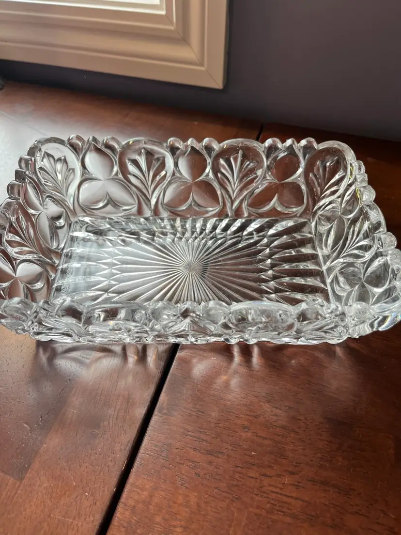 Ornate pressed glass rectangular relish dish with floral and sunburst patterns. 9x6x2.5”