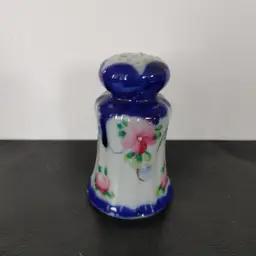 Shaker or Hat Pin Holder. Porcelain. Blue & White with Flowers. No chips or cracks. 3.5 inches high.