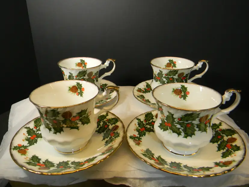 Rosina Bone Fine China from England Set of 4, scalloped edging on the saucer and cup and saucer has gold edging. (cup is 3" x 3" saucer is 5 1/2" X 3/4" High)