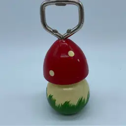#4009 A hand-painted, 5-inch tall novelty mushroom-shaped bottle opener.