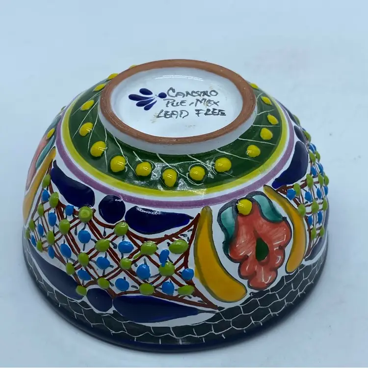 #0703 Hand-painted Talavera ceramic bowl with floral motifs.