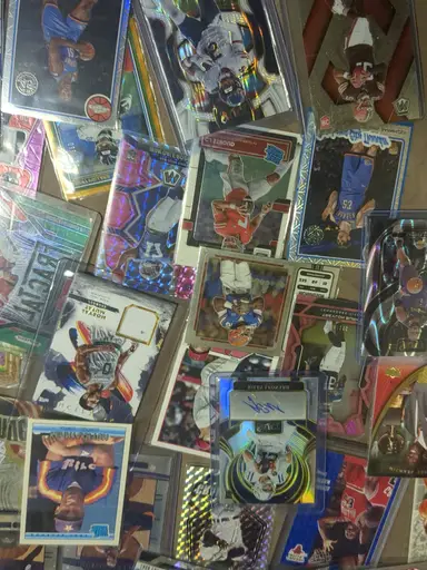NFL and NBA singles and lots no base new and some Jordans