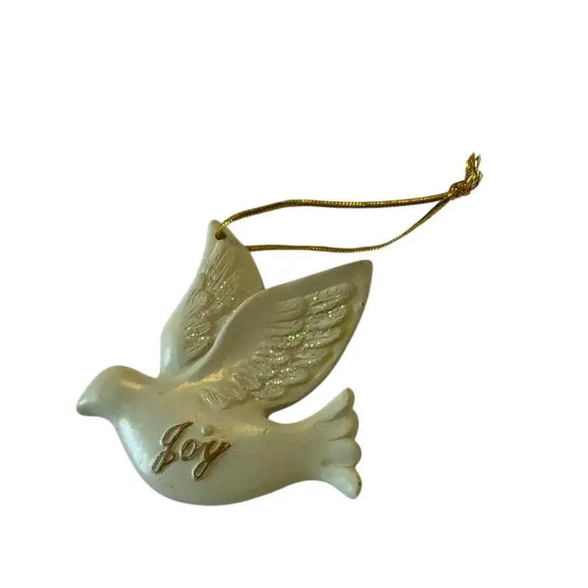 White Peace Dive Christmas Ornament With The Word “Joy” Embossed In Gold Tone Ink