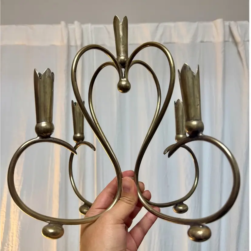 11”x8.5” silver plated table candelabra from Spain.