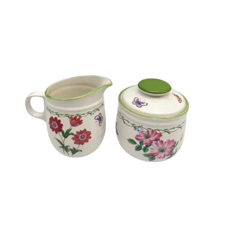 CREAMER SUGAR 
COLLECTION
By Mikasa Studio Nova 
Garden Bloom Pattern
Green Trim Flowers Butterfly Ceramic


Christmas Holiday Hosting 
Party Celebration Winter Gift
Thanksgiving Harvest Autumn Halloween Party Celebration Gift 
Mothers Day Anniversary Birthday
Easter Patriotic