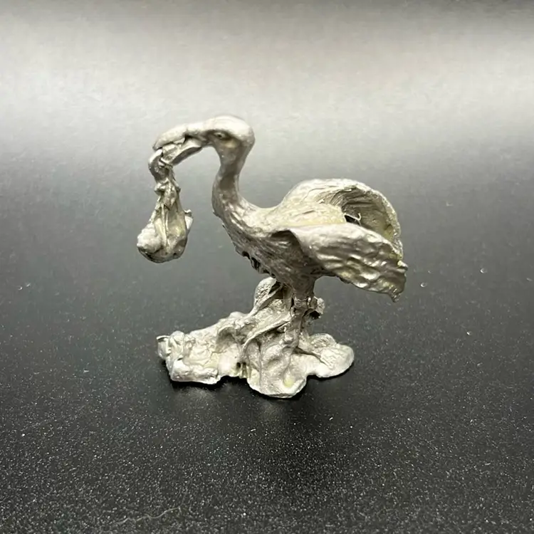 Miniature Pewter Stork And Baby Figurine