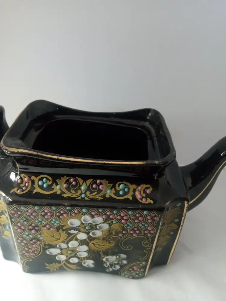 Pretty vintage ceramic teapot  black with painted flowers and other designs  goldish trim  DECOR ONLY