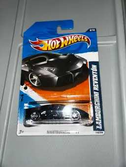 Hot Wheels 2011 Mainline Nightburnerz Lamborghini Reventon Black #118 Sealed
