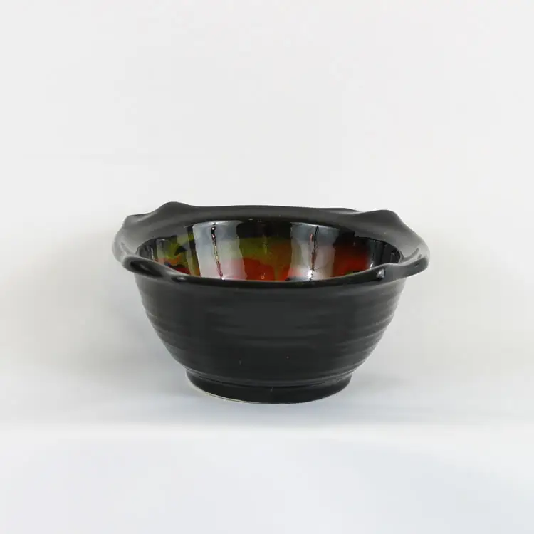 Vintage 1960s California Art Pottery Bowl Black with a Sun Burst of Color