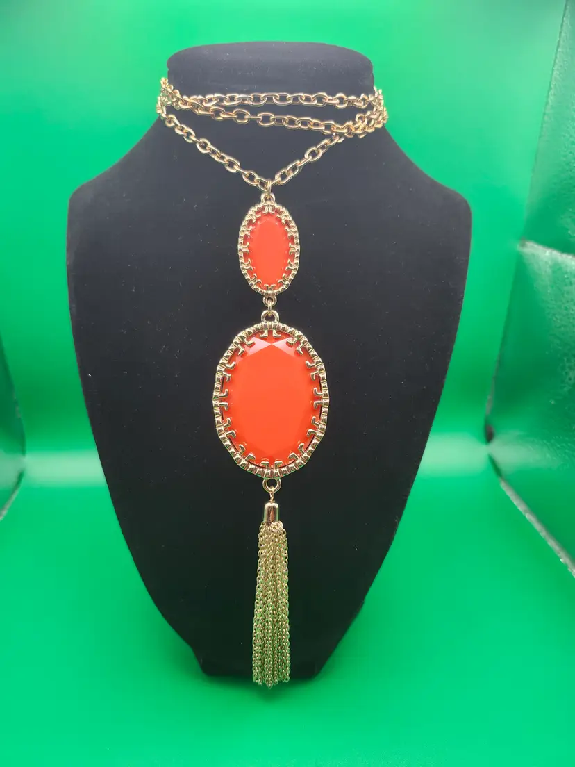 Gold-Tone Oval Orange Lucite Chain Tassel Pendant Necklace".