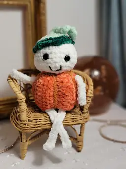 Gourdy the ghost up for adoption and super soft and cuddly with 100% chenille yarn and love.