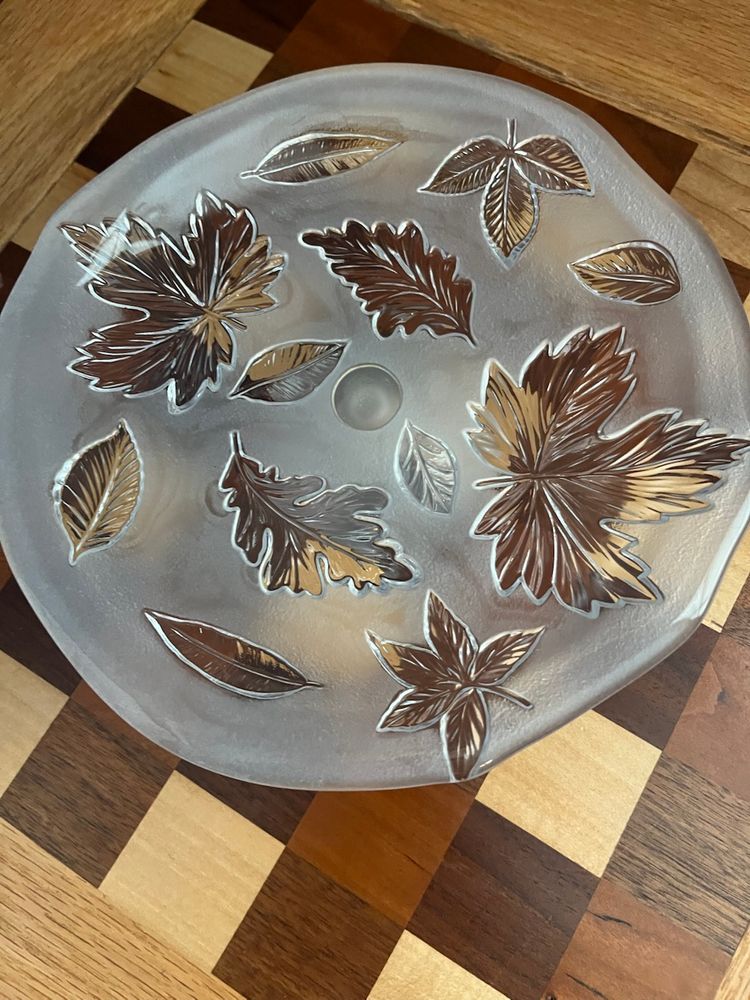 Mikasa Satin Leaves glass plate Pedestal with a frosted leaf pattern.