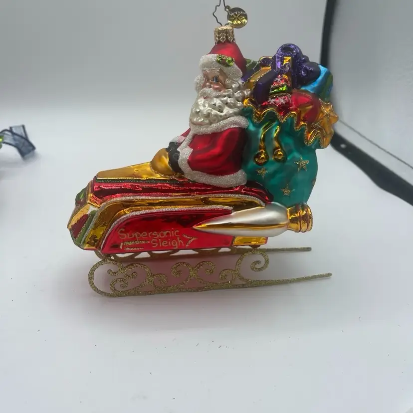 CHRISTOPHER RADKO - SUPERSONIC SLEIGH RIDE - SANTA - RETIRED ORNAMENT - 1014842