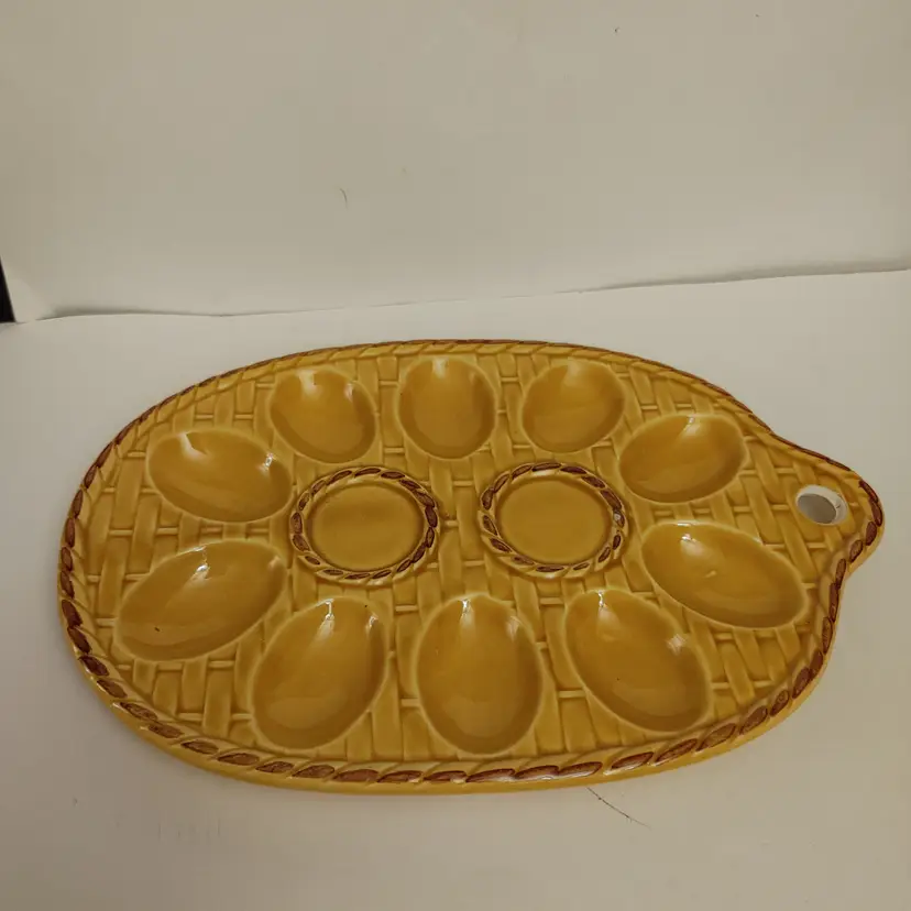 Yellow Egg Plate. Made in Japan. 1960's. Hole for hanging. No chips or cracks. 9.75w x 6.5d.