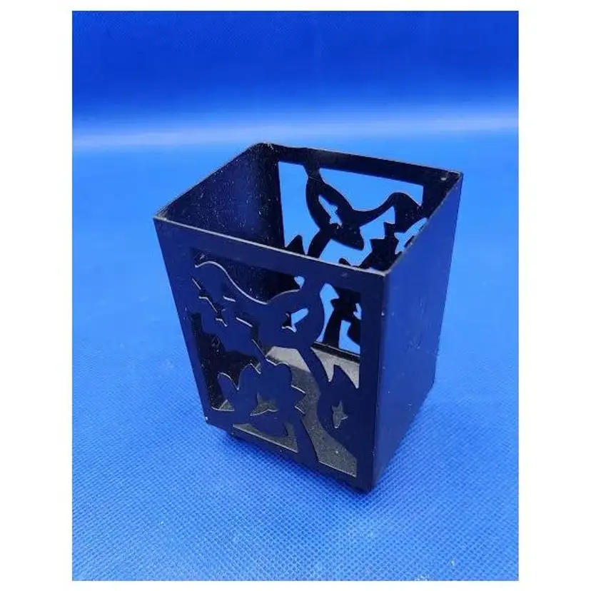 Black tin metal lantern with flowers