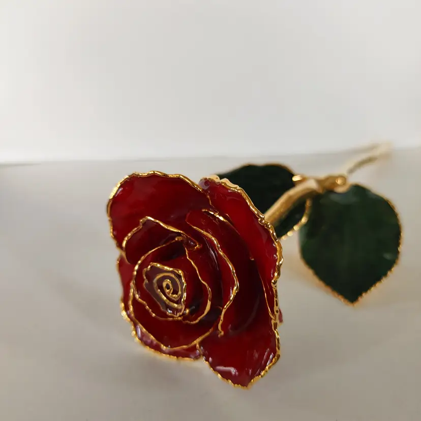 24K gold plated rose. No chips. 11 inches high.