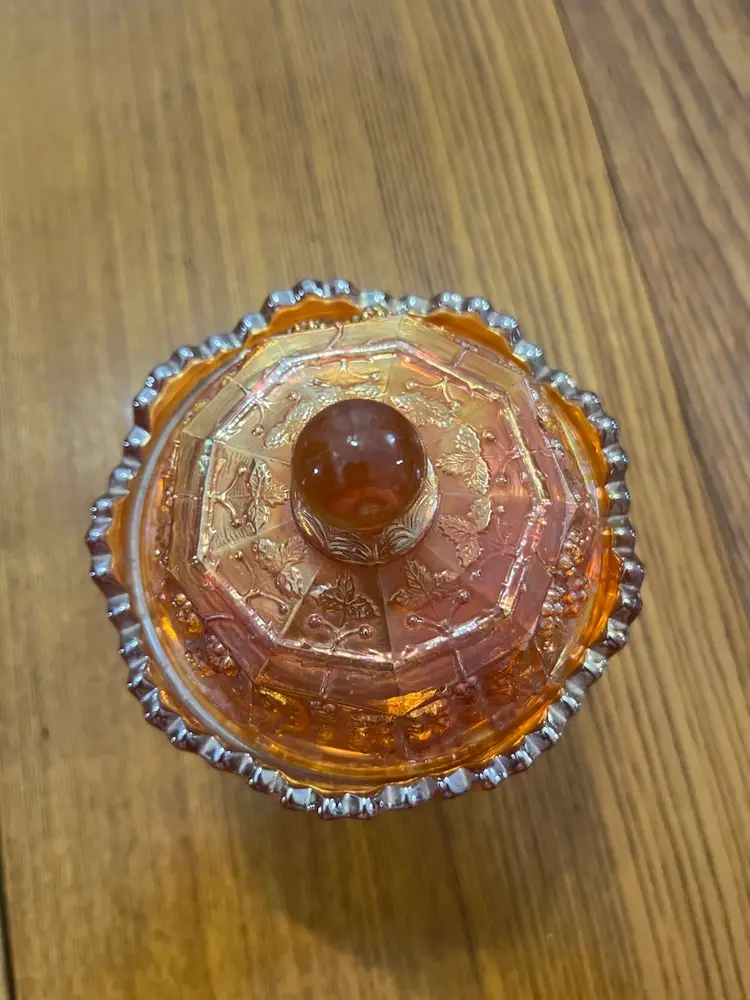 Fenton marigold carnival glass covered sugar bowl with butterfly and berry pattern. 6.5”