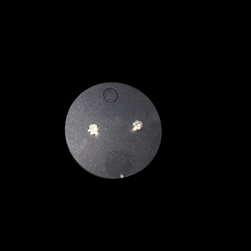Silvertone Post Back Earrings With A Clear Circle Cut Gemstone