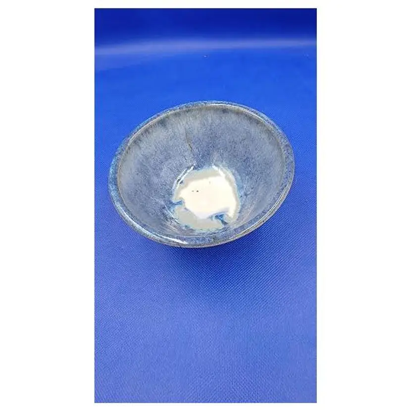 MARKED BOWL WITH BEAUTIFUL COLORS AND DRIP GLAZED