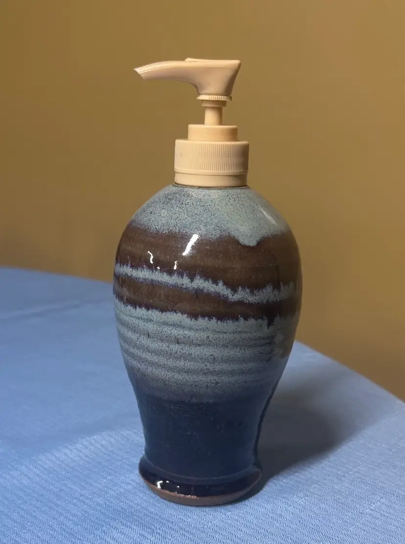 Pottery Soap Dispenser signed 7.75” tall