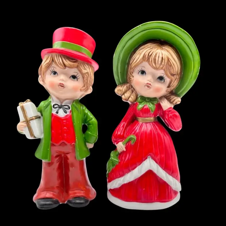Vignette #4 Includes A Set Of 2 Vintage Ardco Victorian Christmas Boy and Girl Figurines XC-1077, 4 Oval Quilted Placemats With Reindeer, Hearts And Christmas Tree Design And A Handmade By Me Acrylic Pour Painted Tree Shaped Wood Ornament With Glitter And Resin Sealed