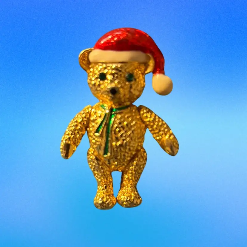 #19 - AAI Gold Tone Teddy Bear With Santa Hat And Green Ribbon
