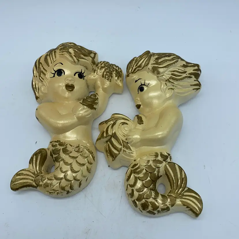 #5017 Vintage Miller Studios chalkware mermaid wall hangings with gold accents.