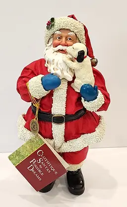 Clothtique Santa Claus Holding Dog Figurine by Possible Dreams 10.25"