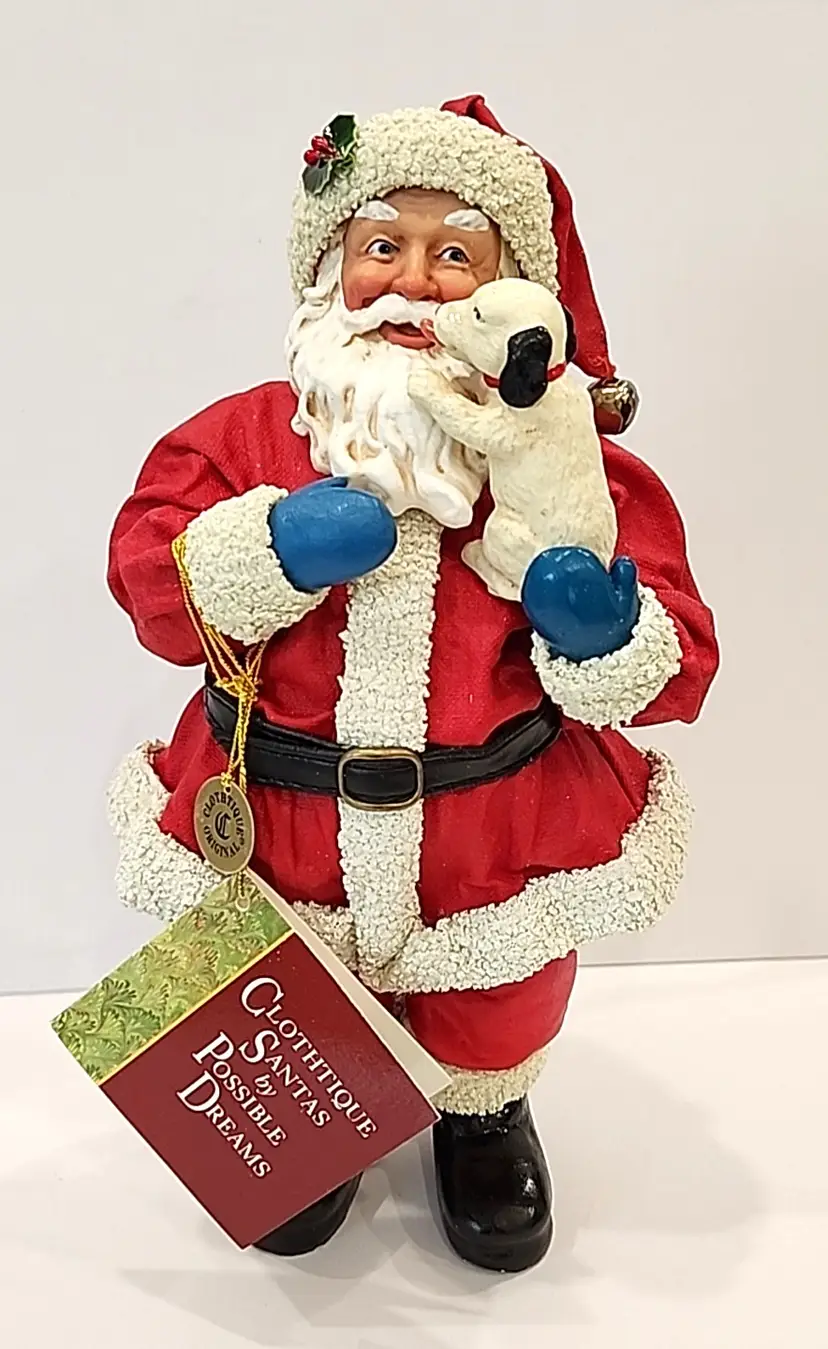 Clothtique Santa Claus Holding Dog Figurine by Possible Dreams 10.25"