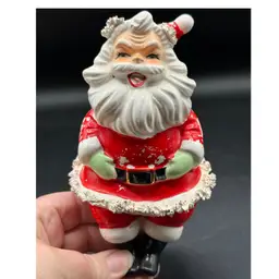 vintage Lefton figurine features a festive Santa Claus design with spaghetti Trim