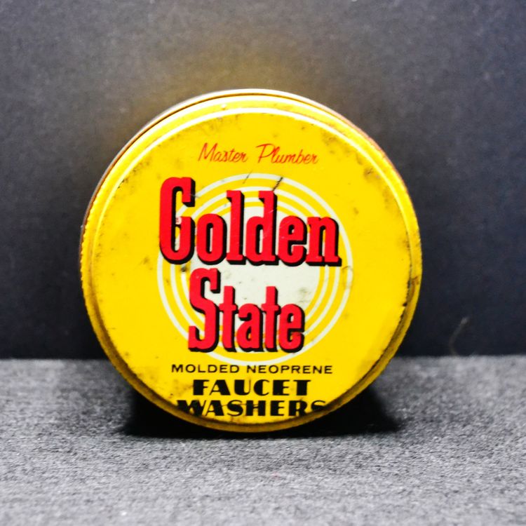 Vintage Master Plumber Faucet Washer Tin – Yellow Metal Advertising Canister – Industrial Decor (Empty)