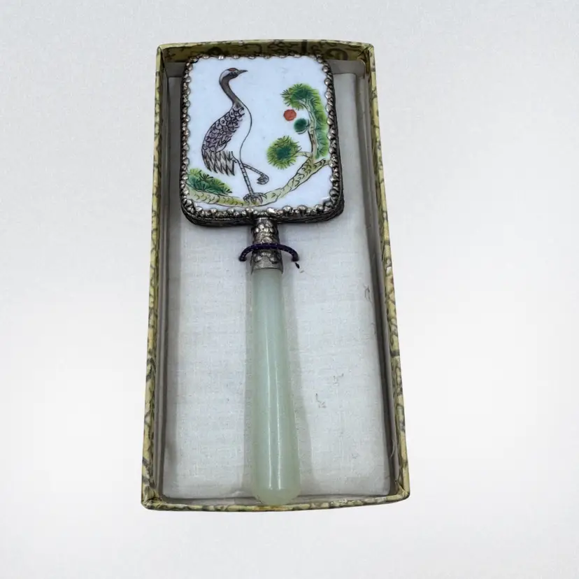 Vintage Enamel and jade-like handled hand mirror with crane motif. 5” In Original Box