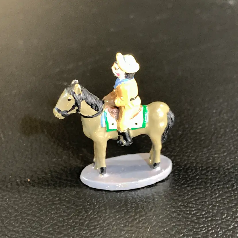 Tiny Metal Man on Horse