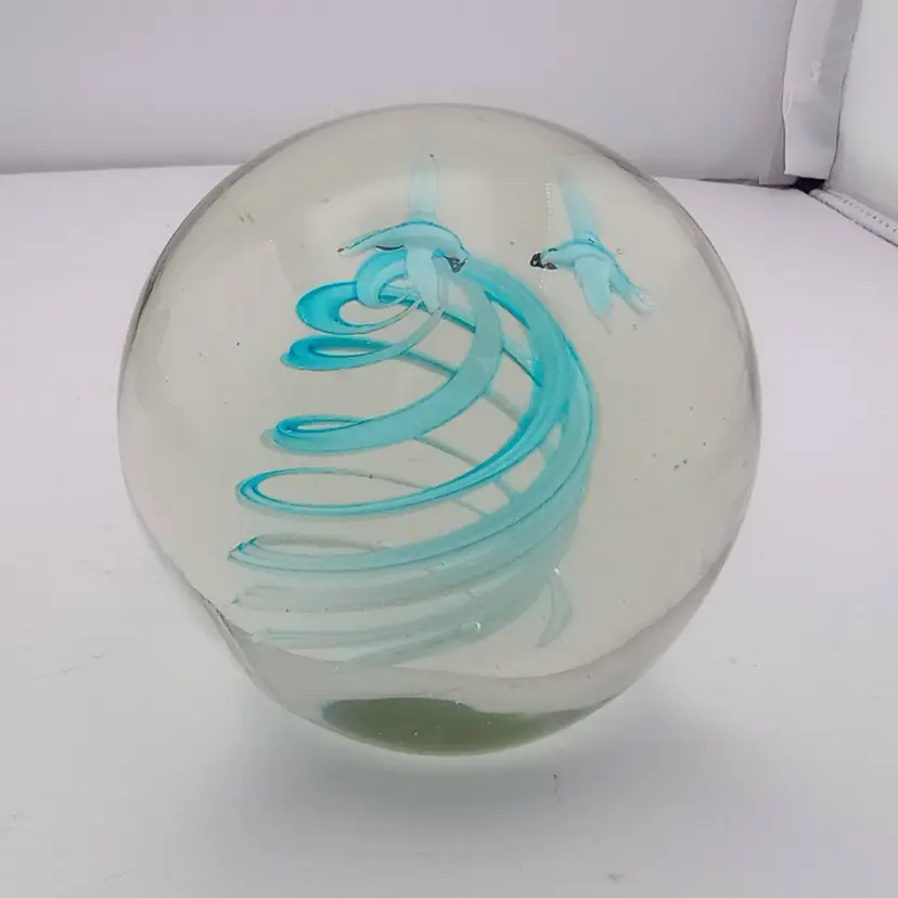 Turquoise birds and swirls paperweight