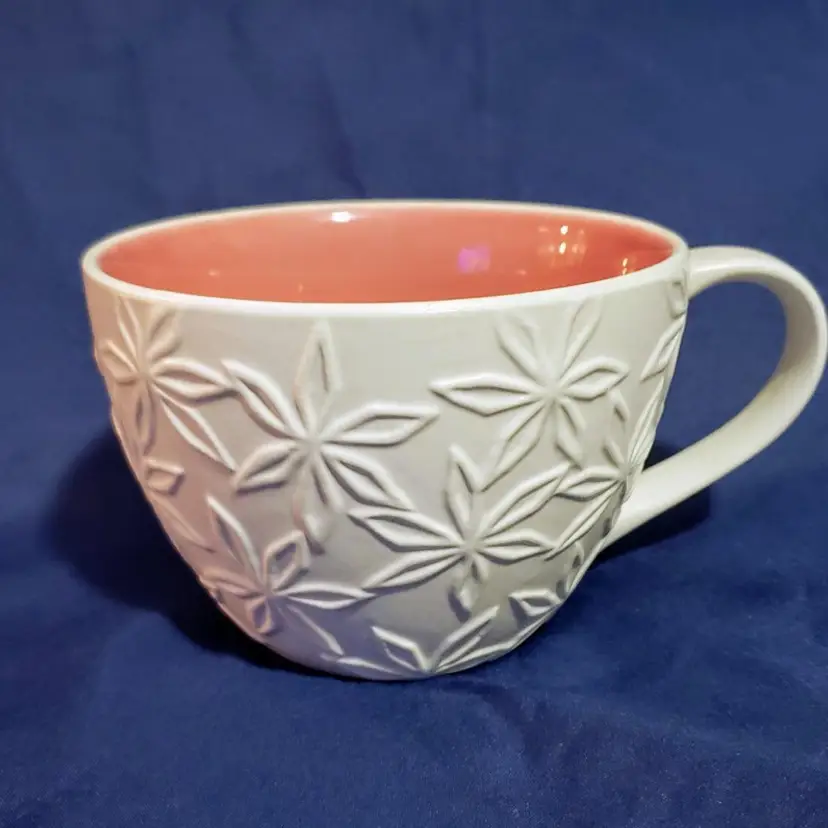 2008 Starbucks White Embossed Flower mug with pink interior