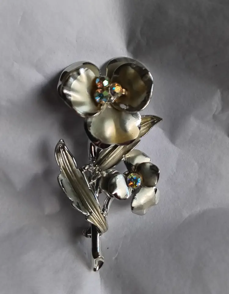 Vintage Silvertone Floral Brooch with Aurora Borealis Rhinestones Coro?