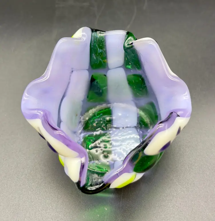 Fused glass handkerchief votive cup or small planter.  Greens, purple and white glass