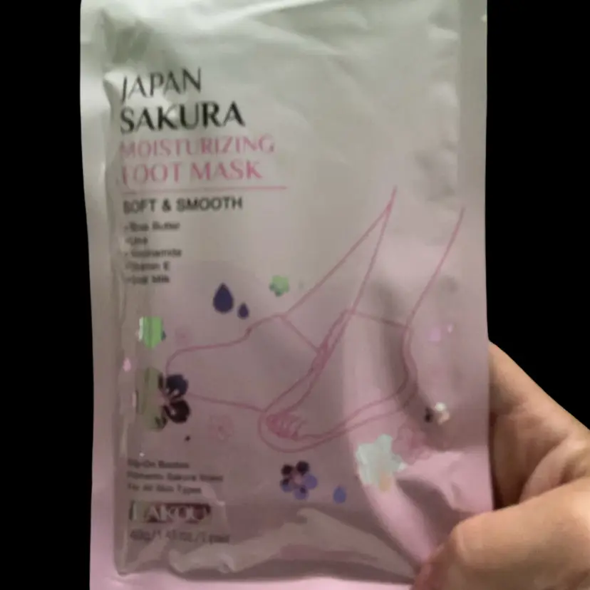 32. Set Of 2~~ Japan Sakura Moisturizing Foot Mask. Soft & Smooth. With Shea Butter, Urea, Niacinamide, Vitamin E, Goat Milk. Just Slip On Booties & Relax!!!
