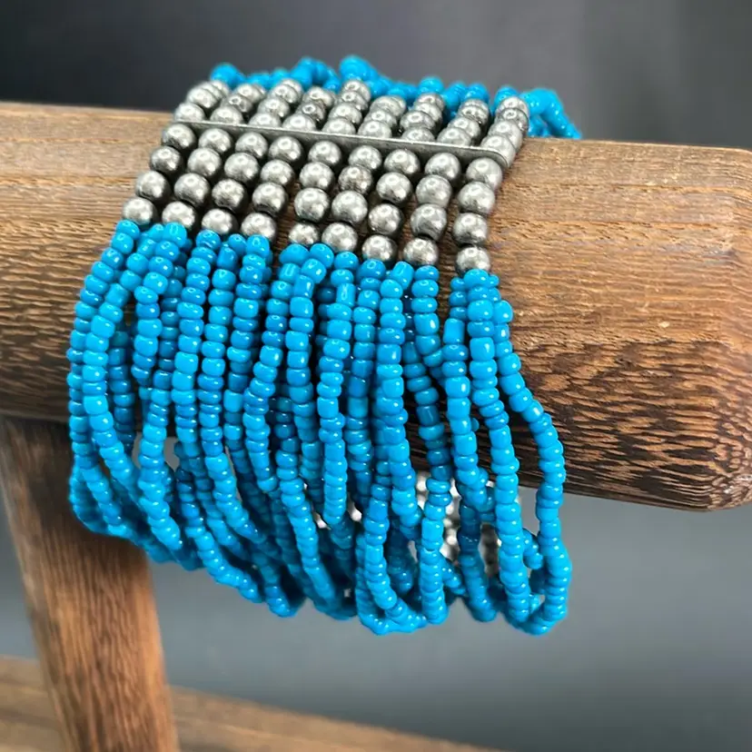 Multi Strand, Turquoise Blue Bracelet with Silver Beads Stretch 7” Long 27 Strand
